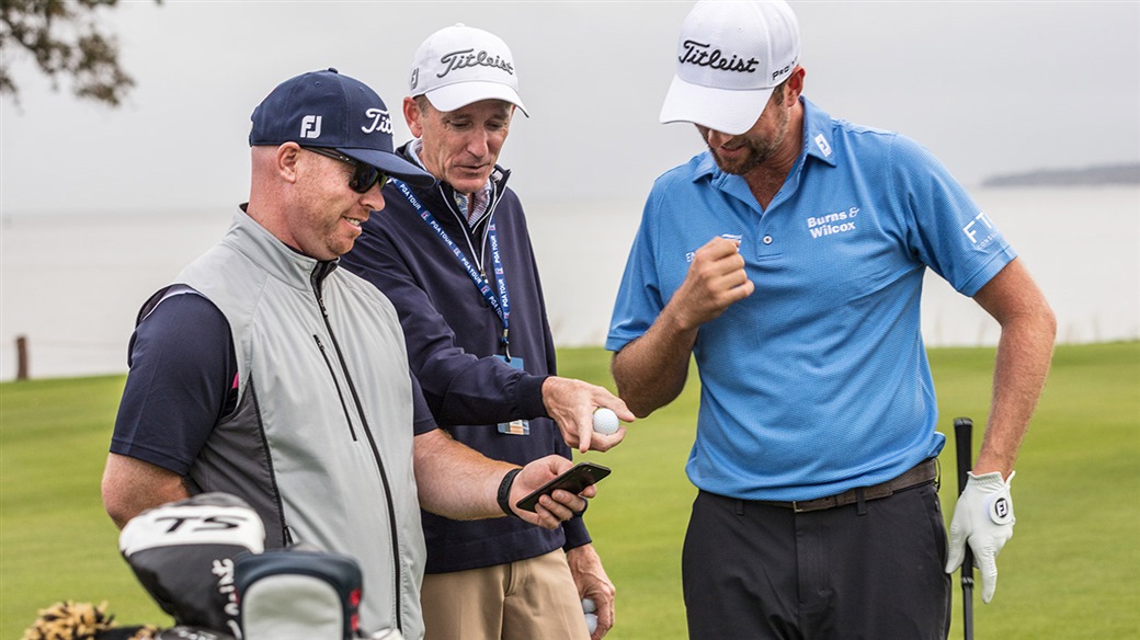 Titleist tour reps JJ Van Weezenbeeck and Fordie Pitts review spin and launch numbers during golf ball testing with Webb Simpson in 2019.