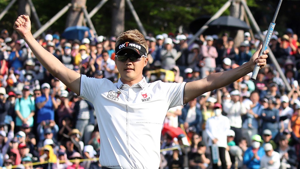 HaeTee Lee raises his arms in triumph after claiming victory at the 2019 GC Caltex MaeKyung Open