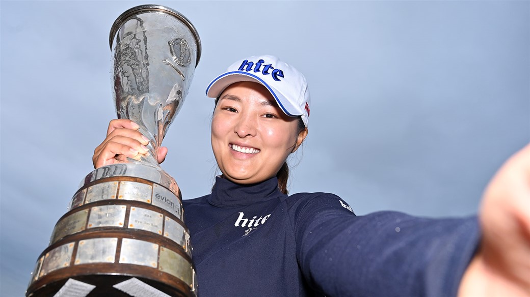 Jin Young Ko embraces the trophy after winning the 2019 Evian Championship.